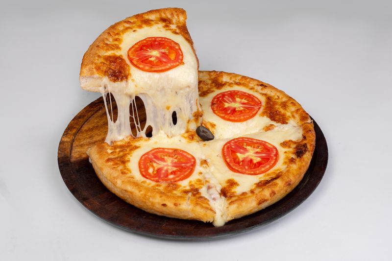 Classic cheese pizza with melted mozzarella