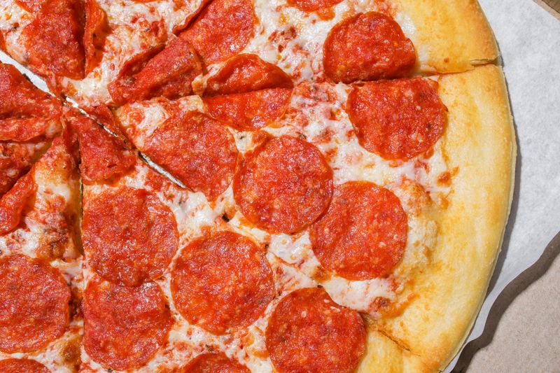 Pepperoni pizza with extra pepperoni and crispy crust